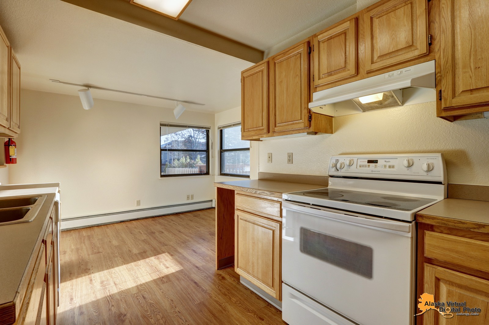 Kitchen with brown cabinets and stove