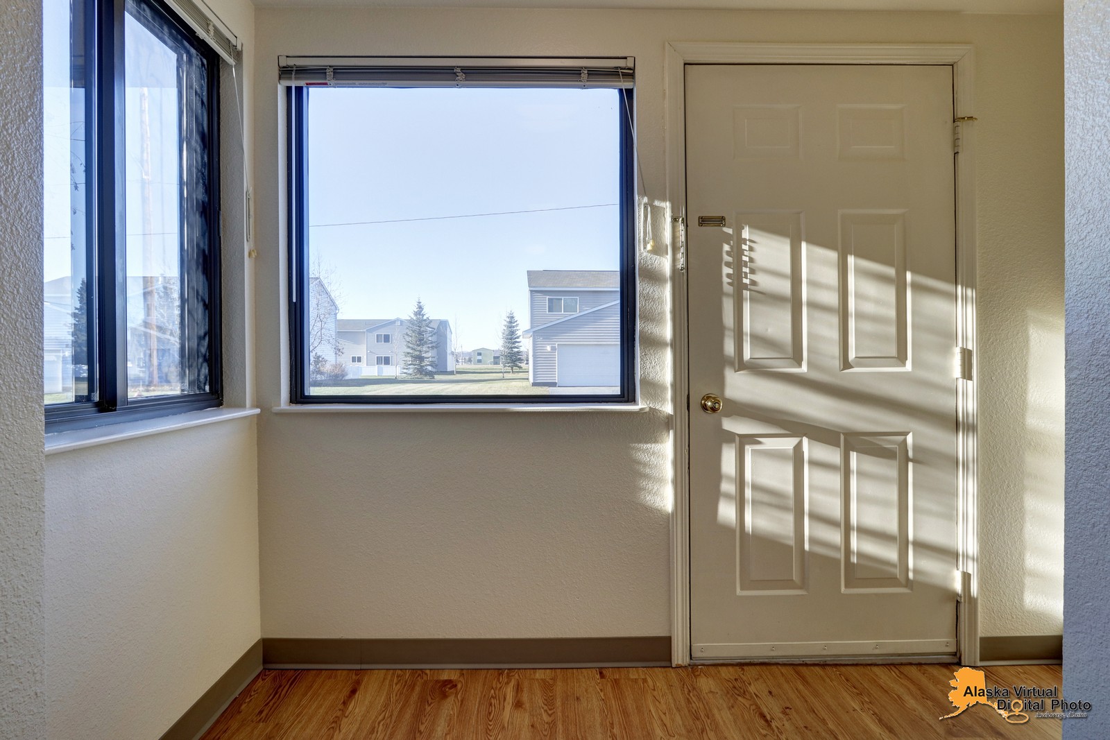 Front door next to large window