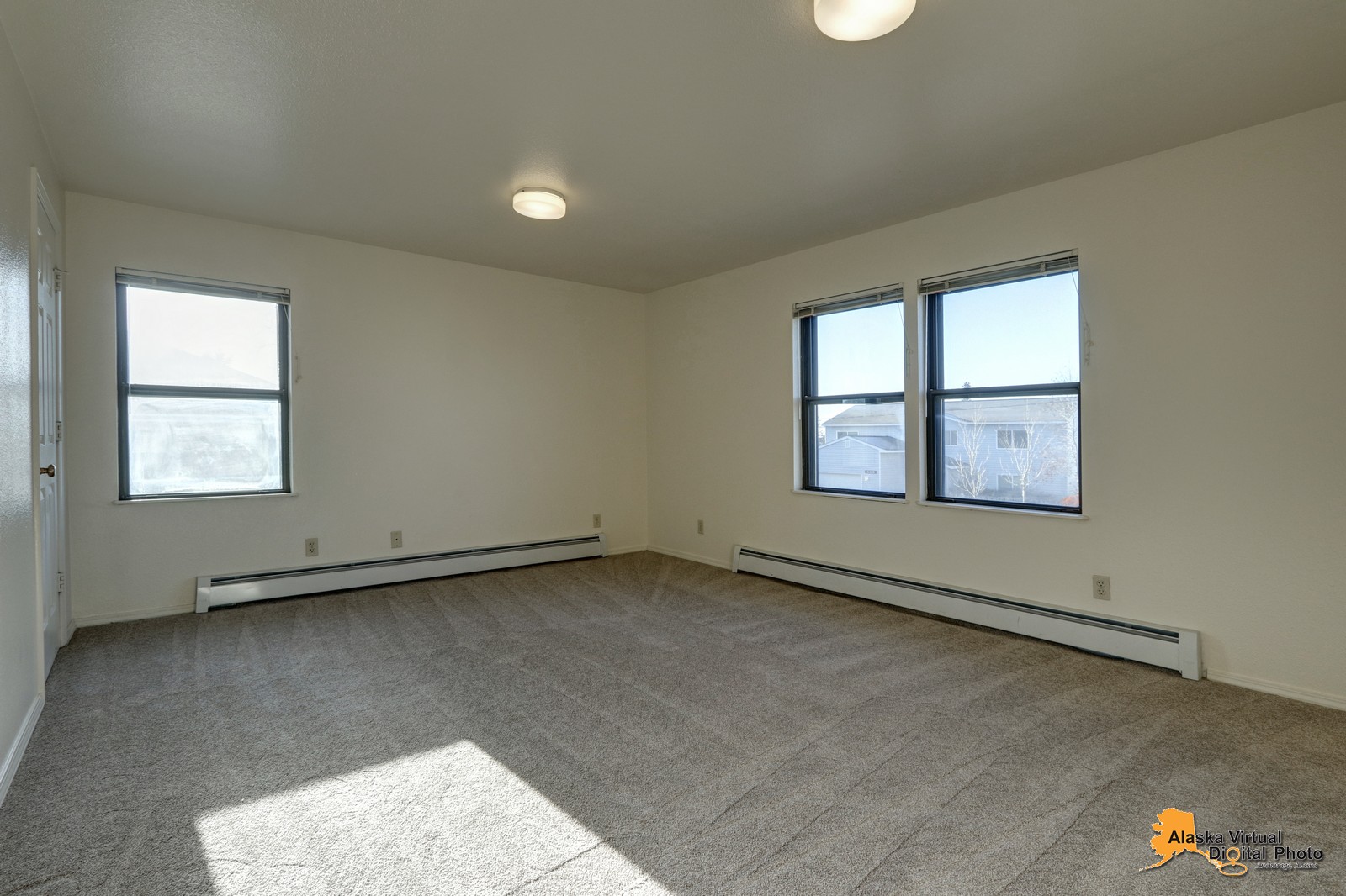 Master bedroom with multiple windows