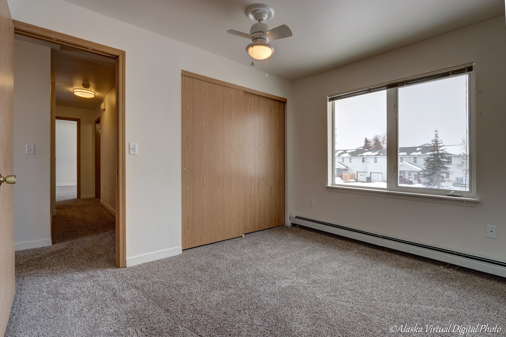 bedroom with closets and fan