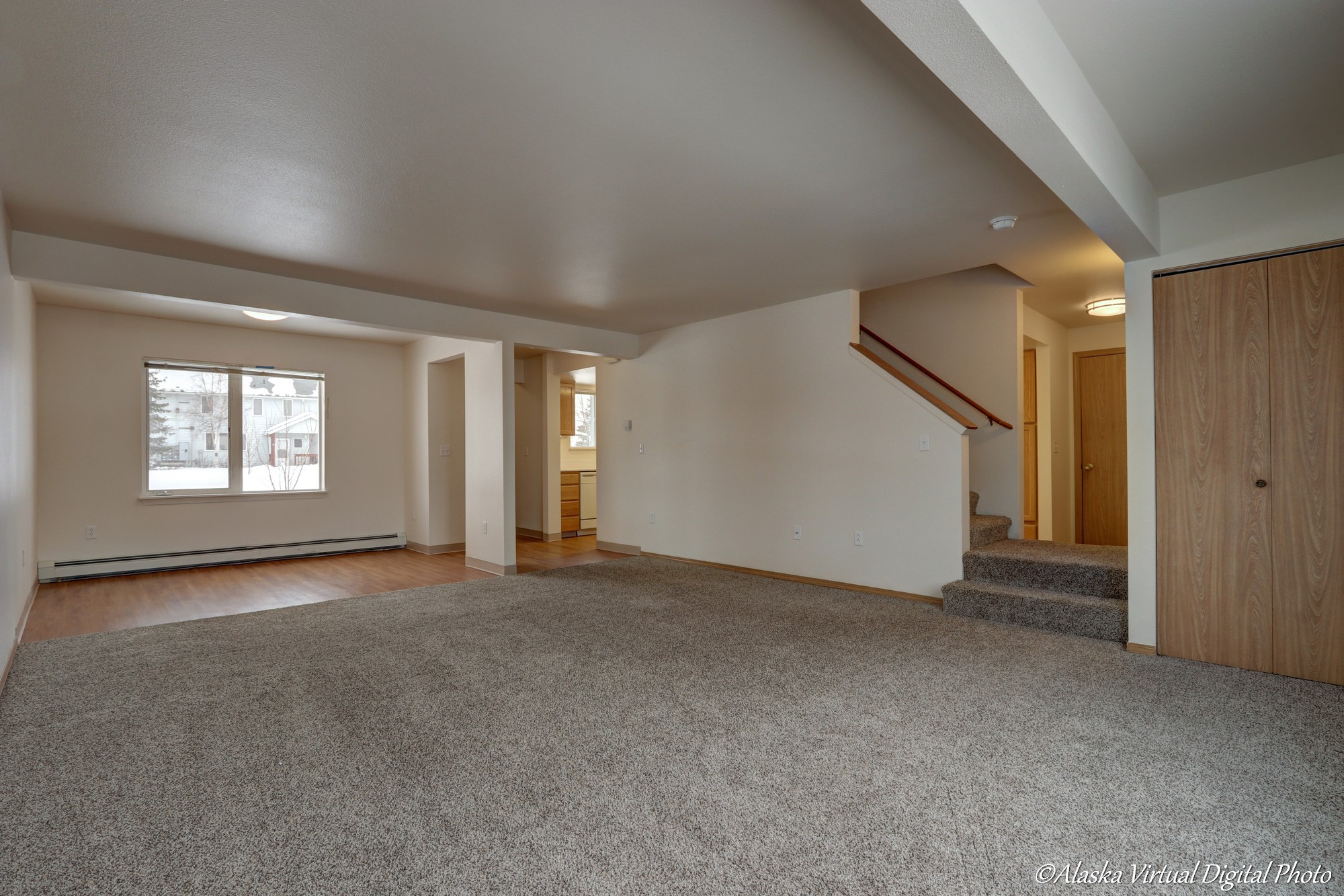 large living area with stairway