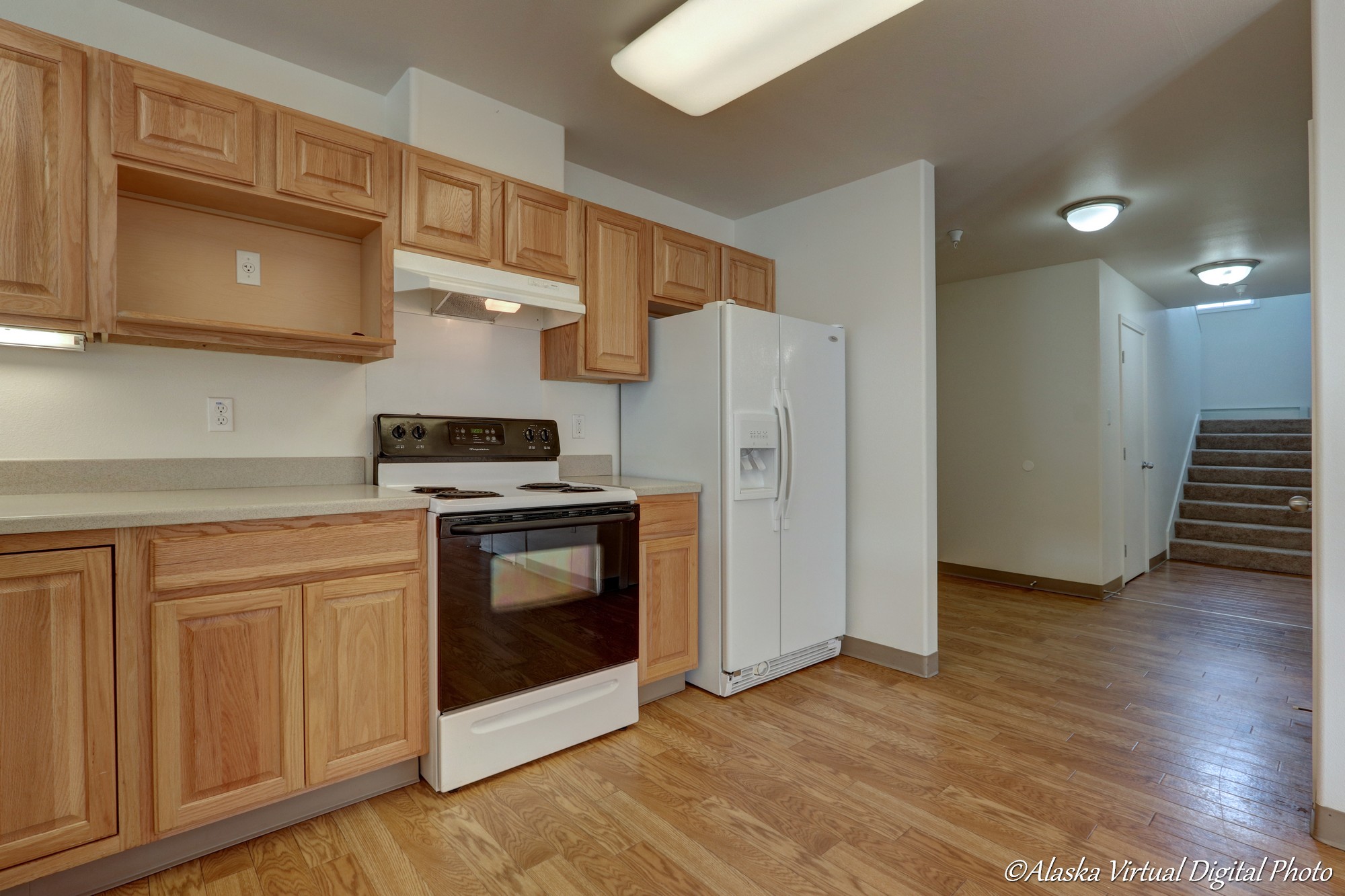 Range and fridge in Kitchen