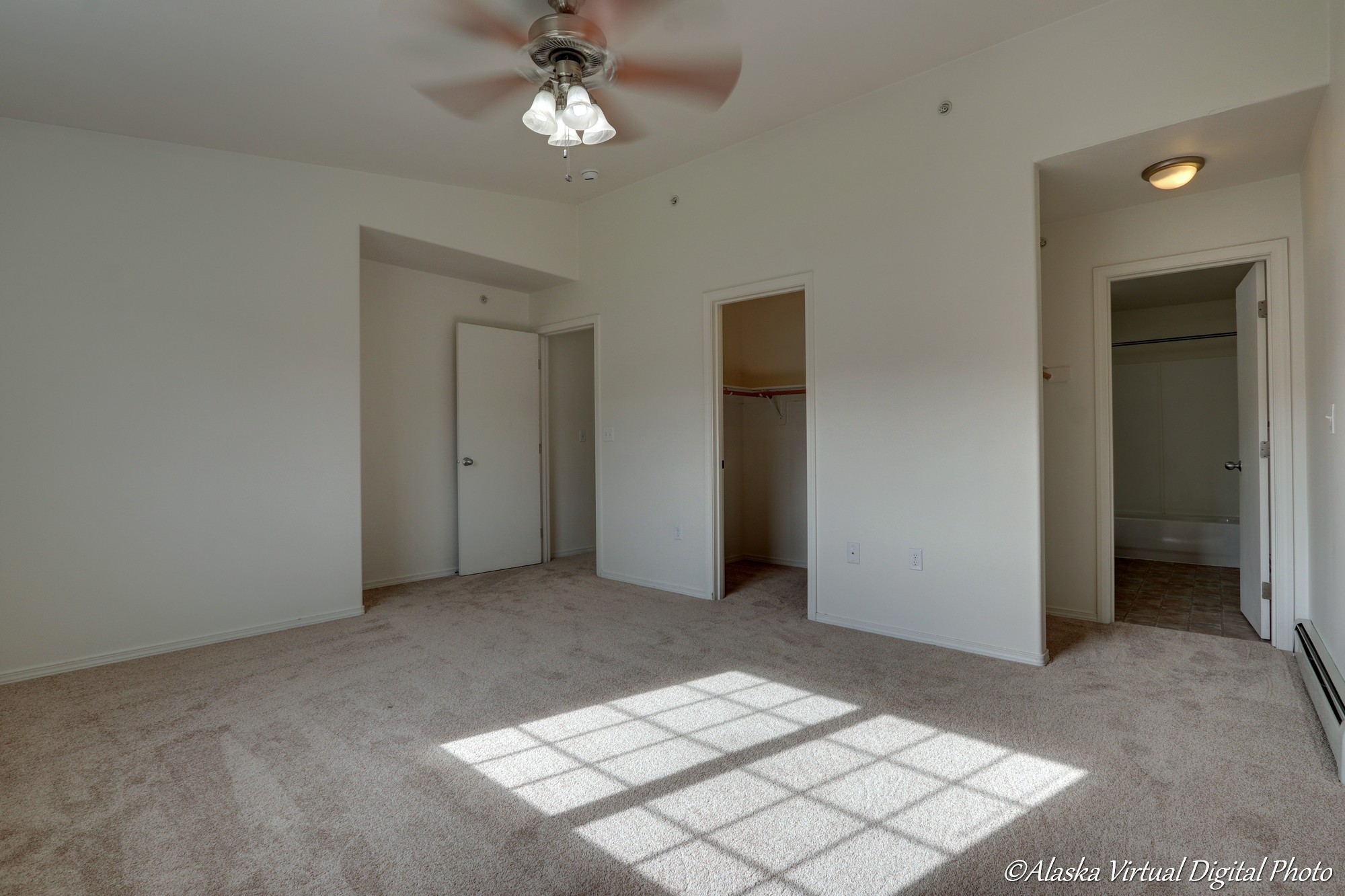 Master bedroom with closet and bathroom