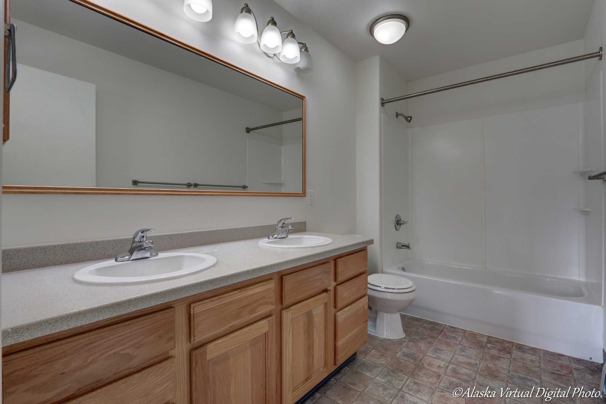 Dual sink vanity, Large mirror pictured in master bathroom