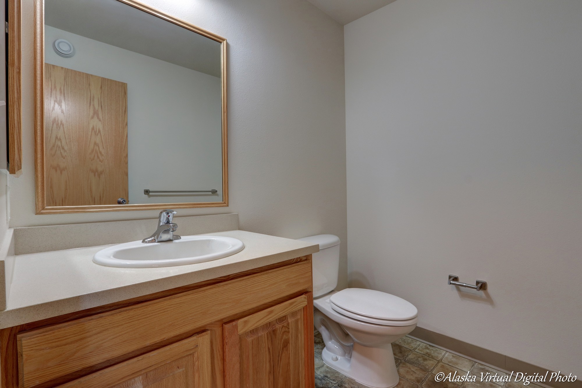 Image of powder room with white counters