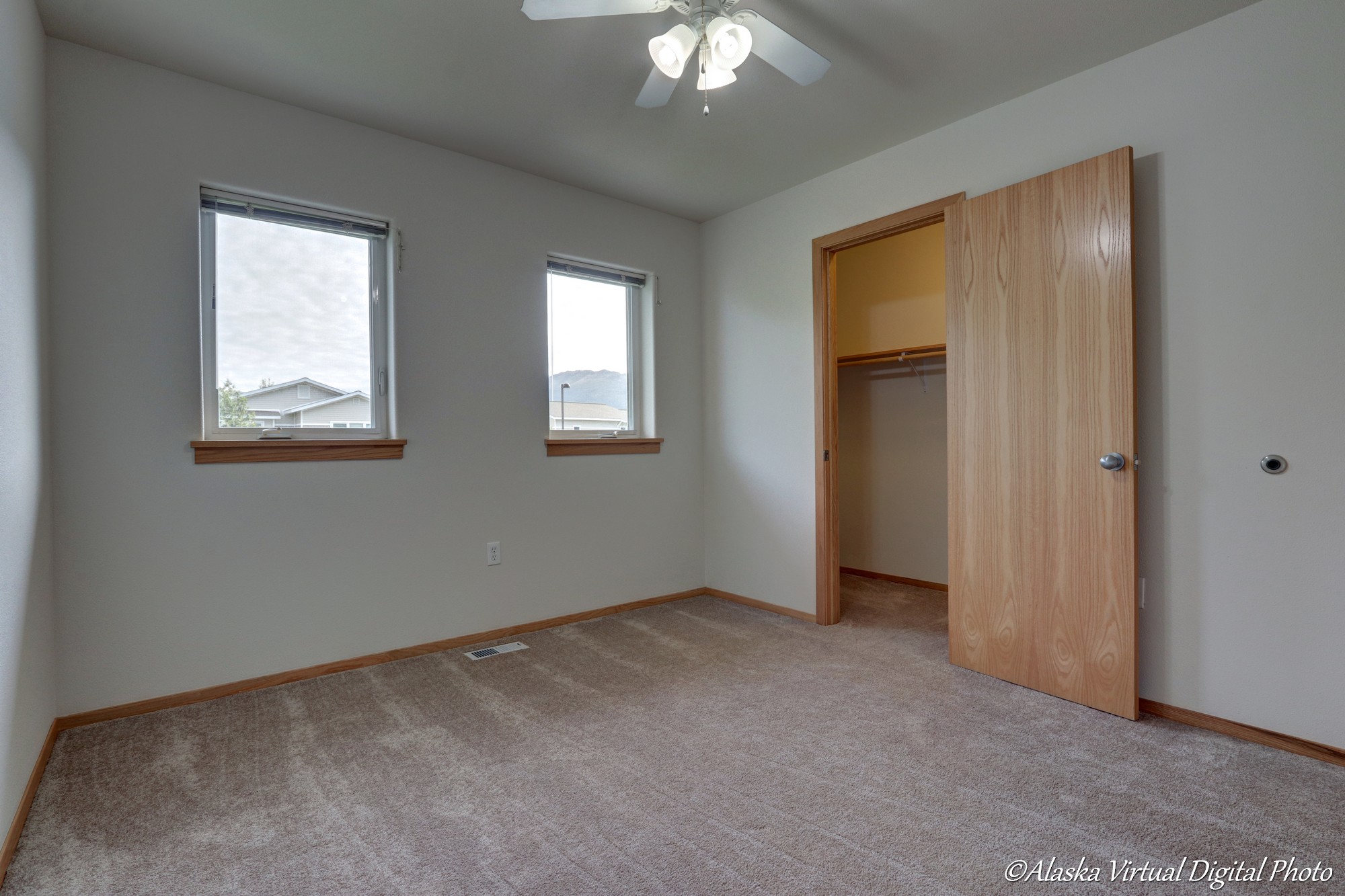 bedroom with closet and fan