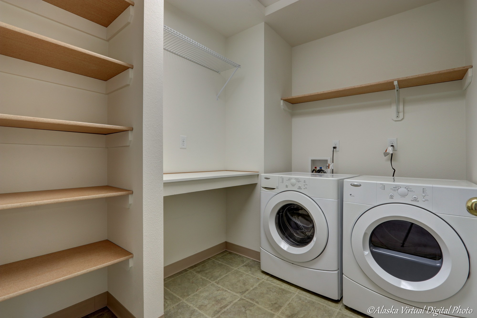 laundry room with washer and dryer