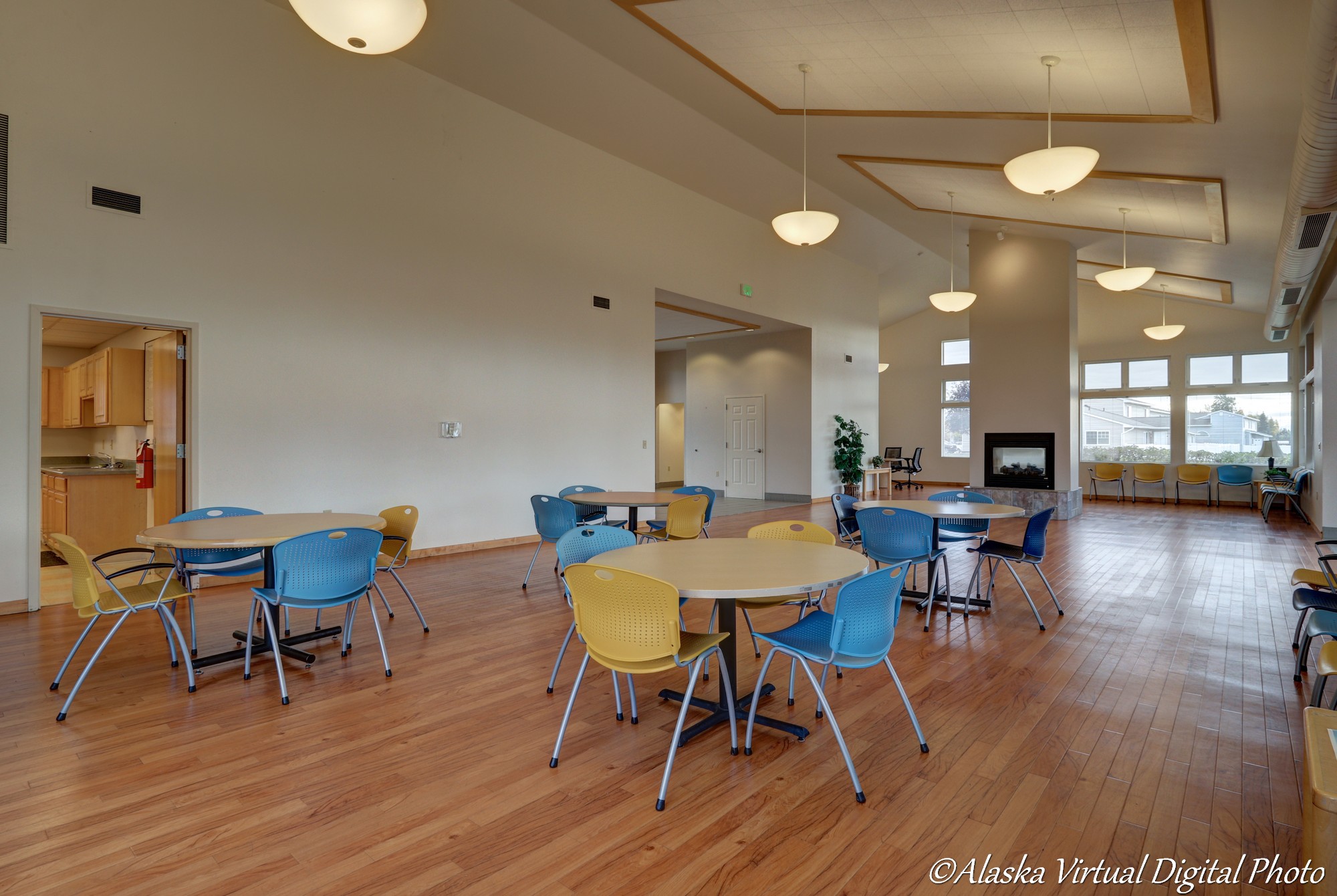 Photo of tables and chairs in community center