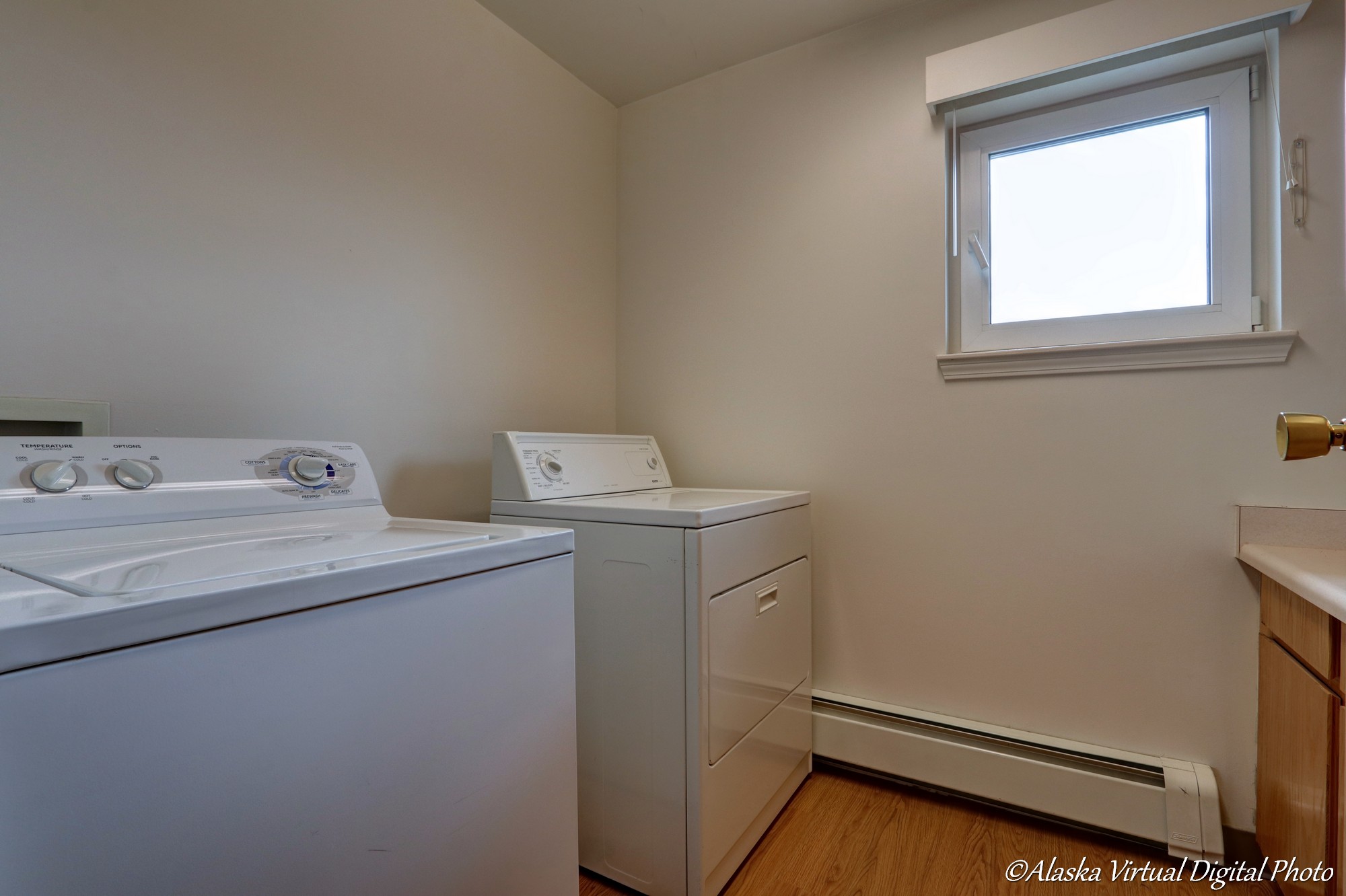 Photo of side by side washer and dryer