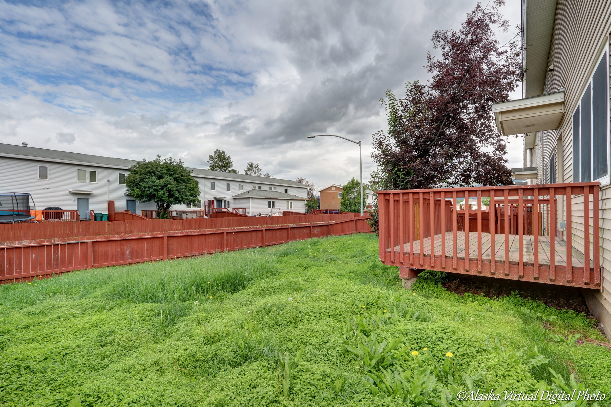 Photo of Back yard with red deck