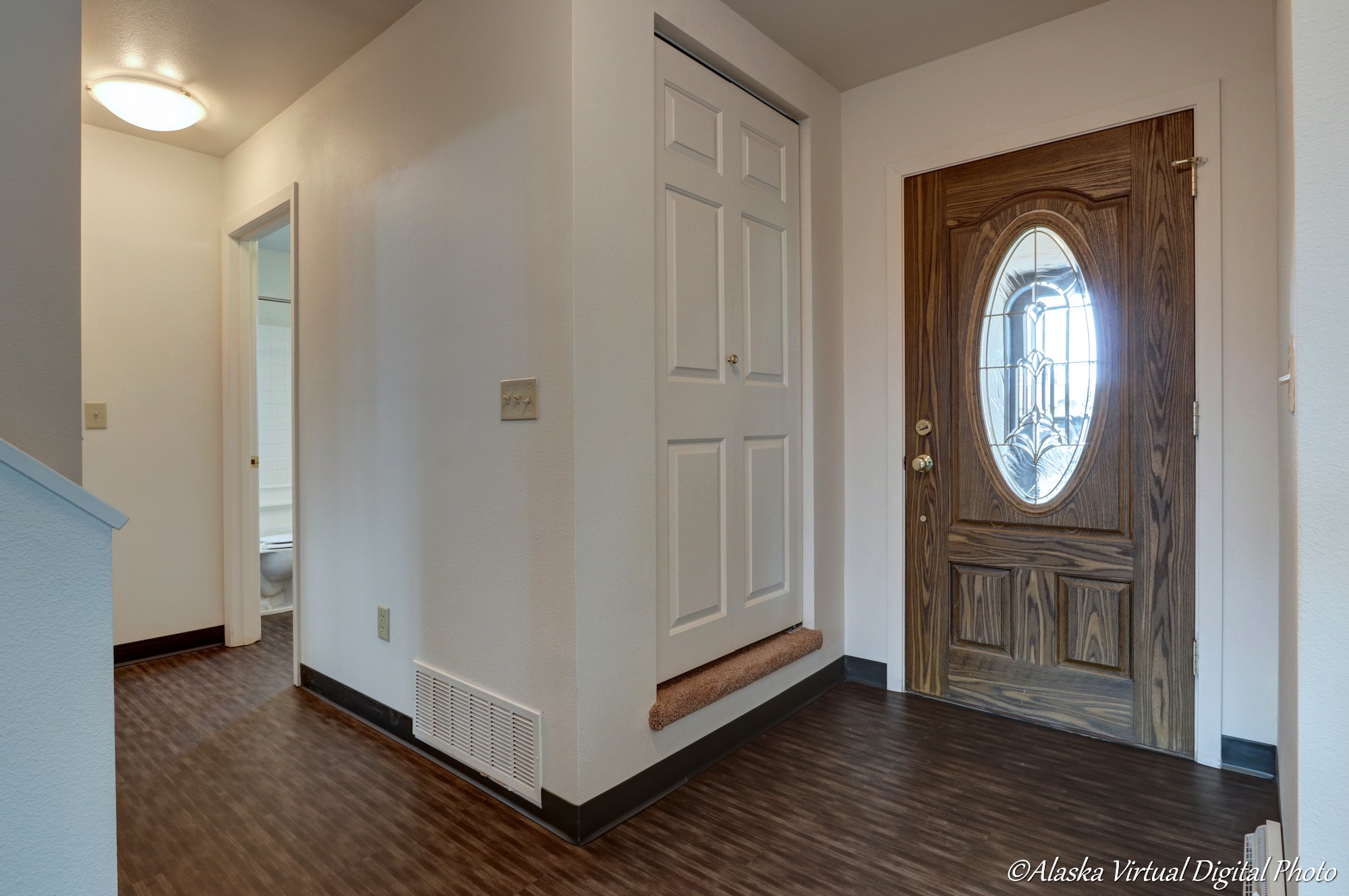 Entry closet at the front of the home