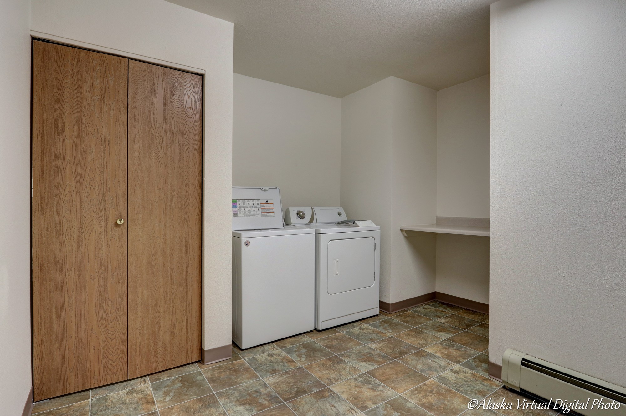 Photo of Laundry room with washer and dryer