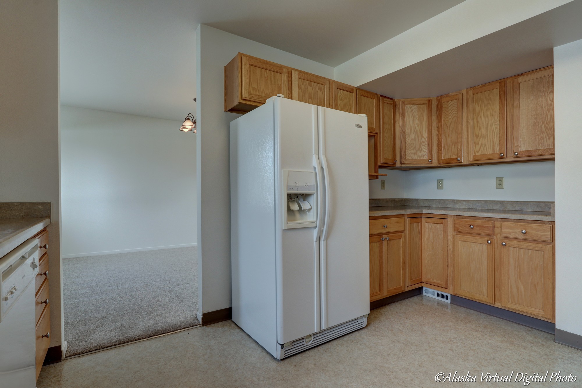 View of large fridge in kitchen