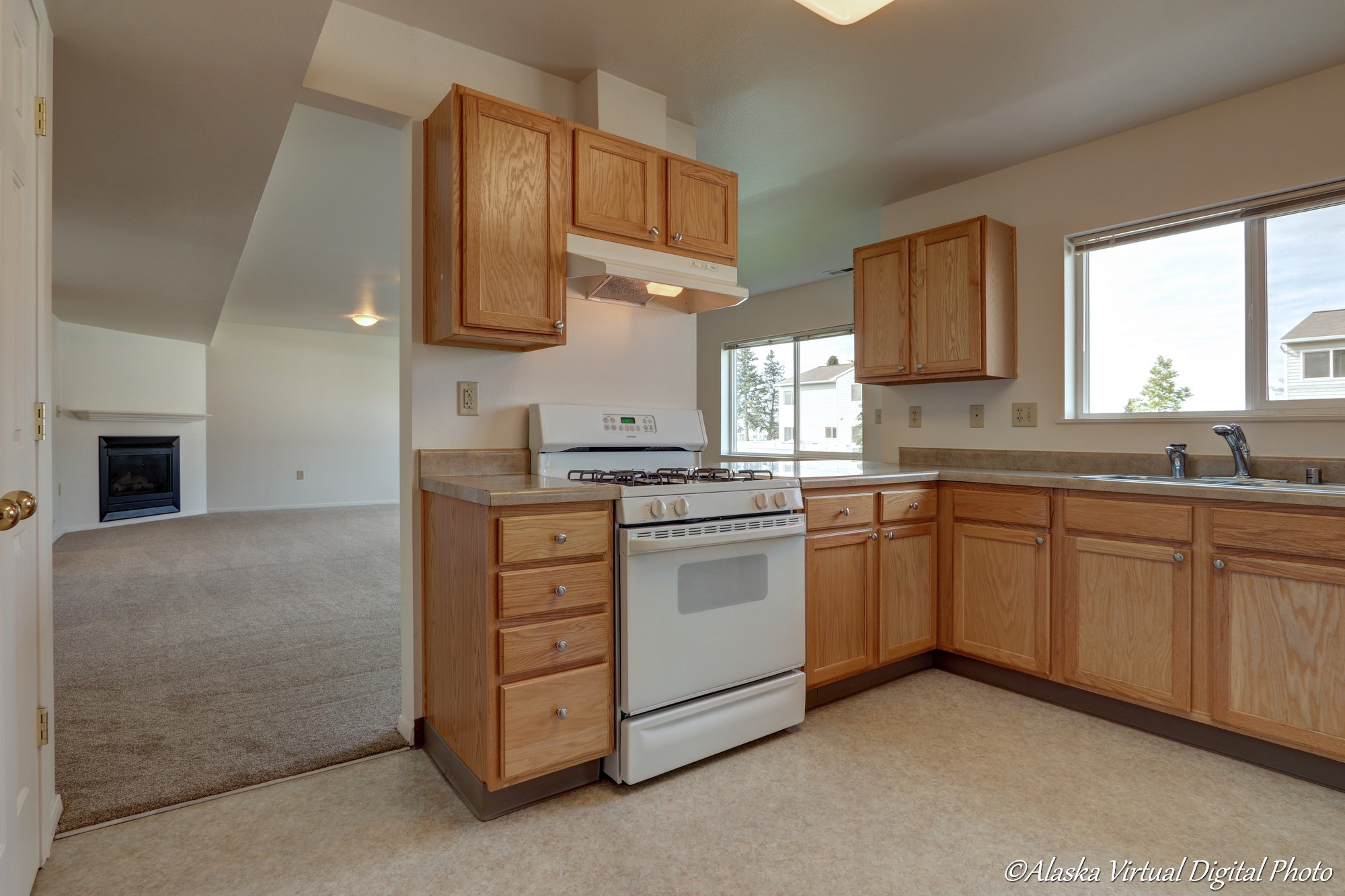 L Shaped Kitchen with opening into living area