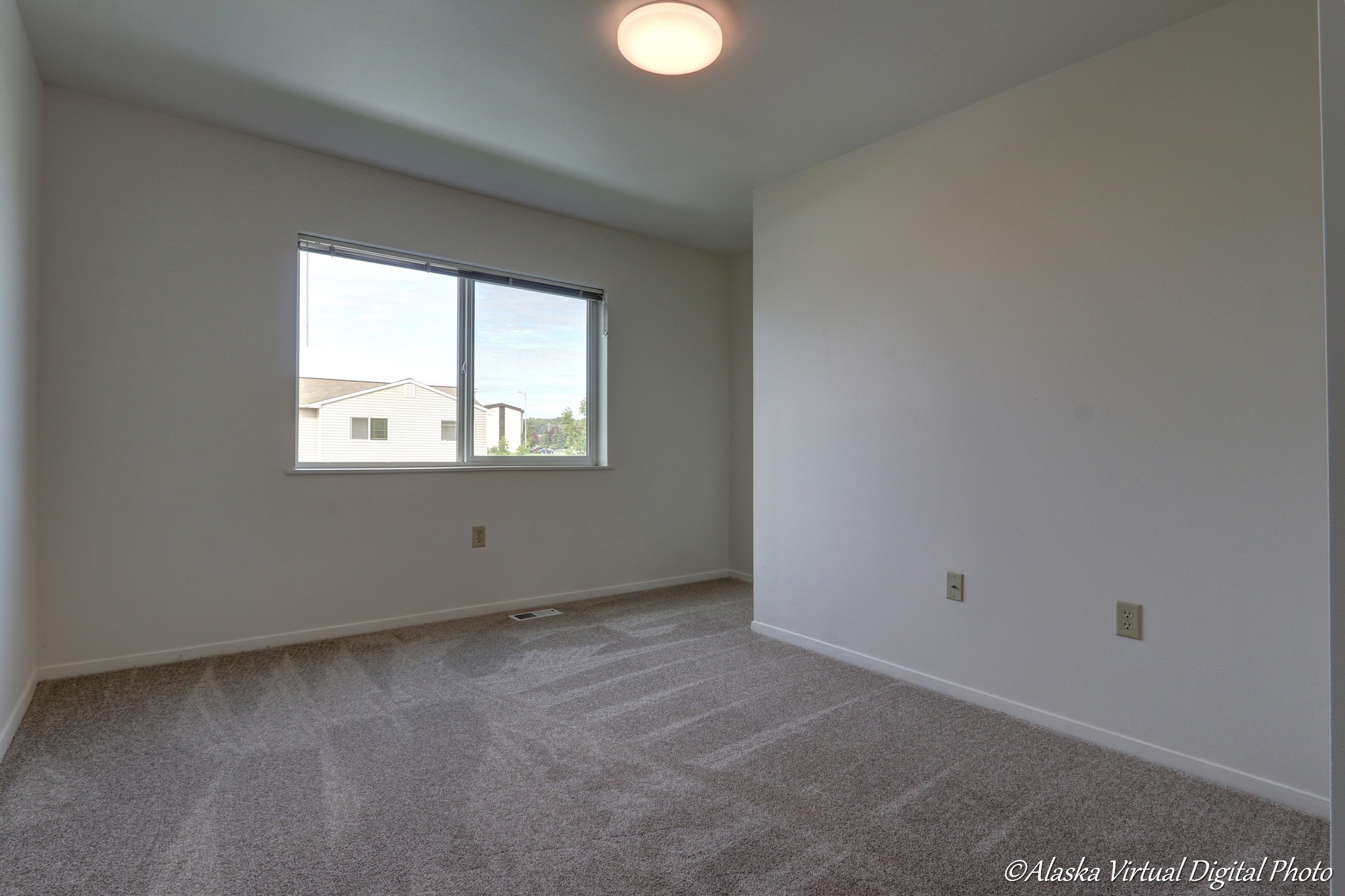 Image of bedroom with rectangular windows