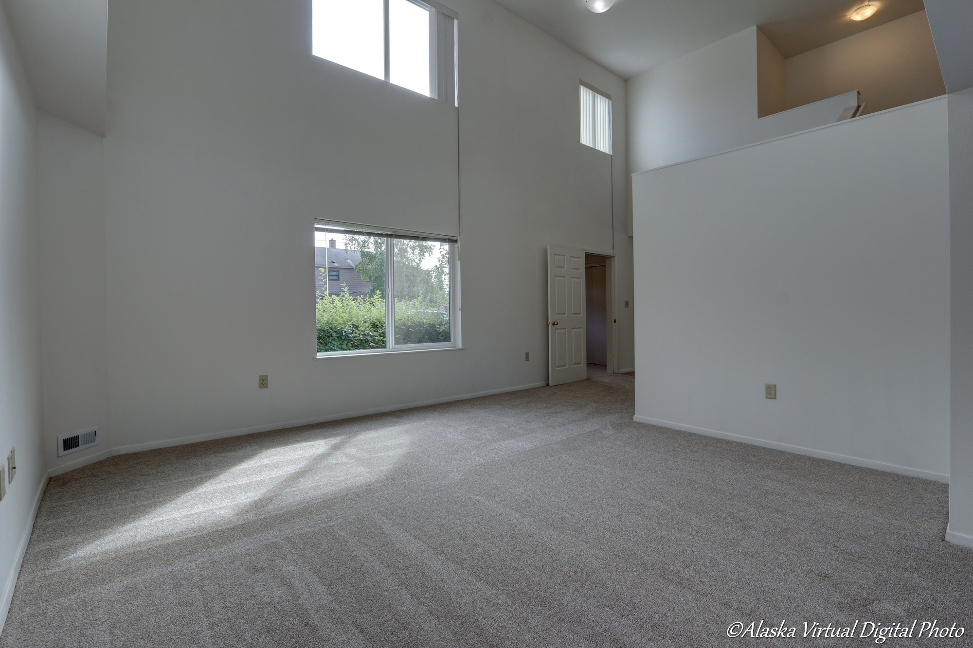 Large windows let light into living room