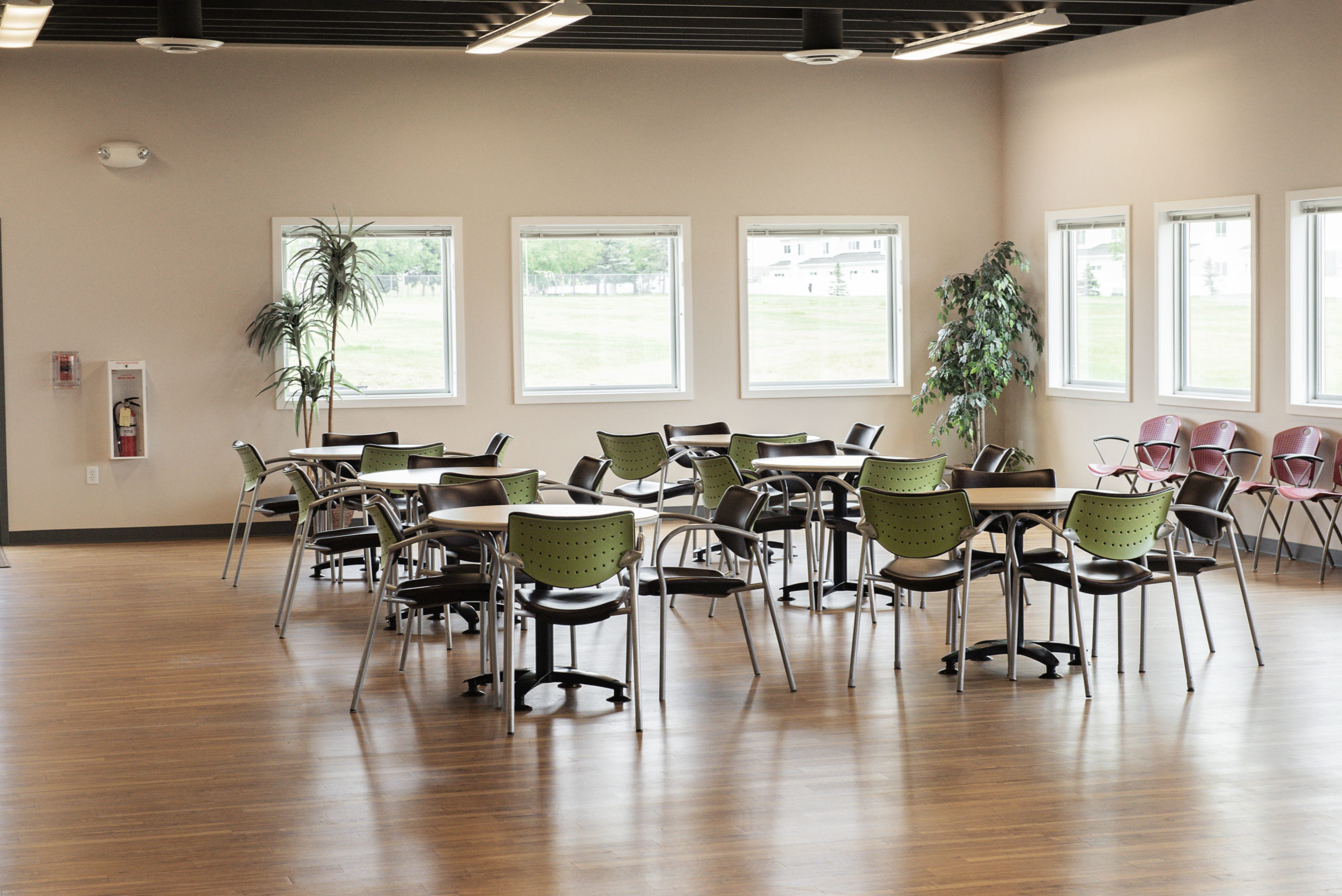 chairs at circular tables at the Richardson community Center