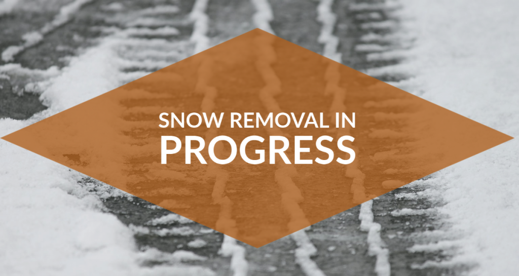 snow removal graphic text over snowy tire mark