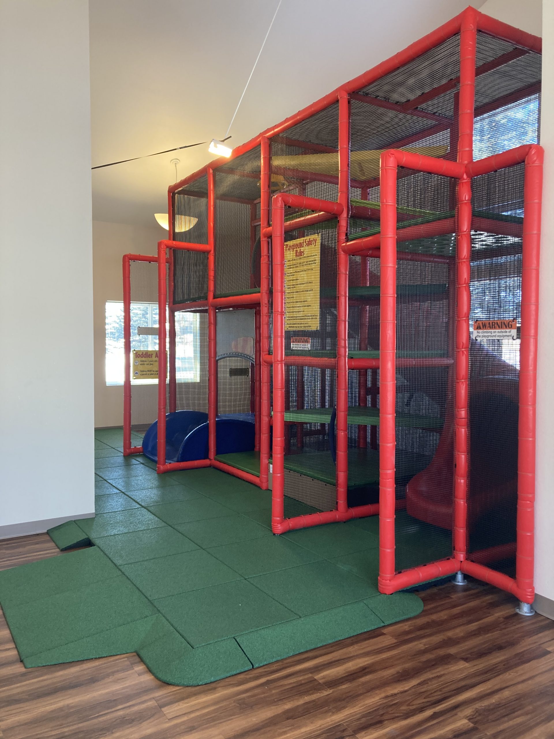 Indoor play area with padded floor