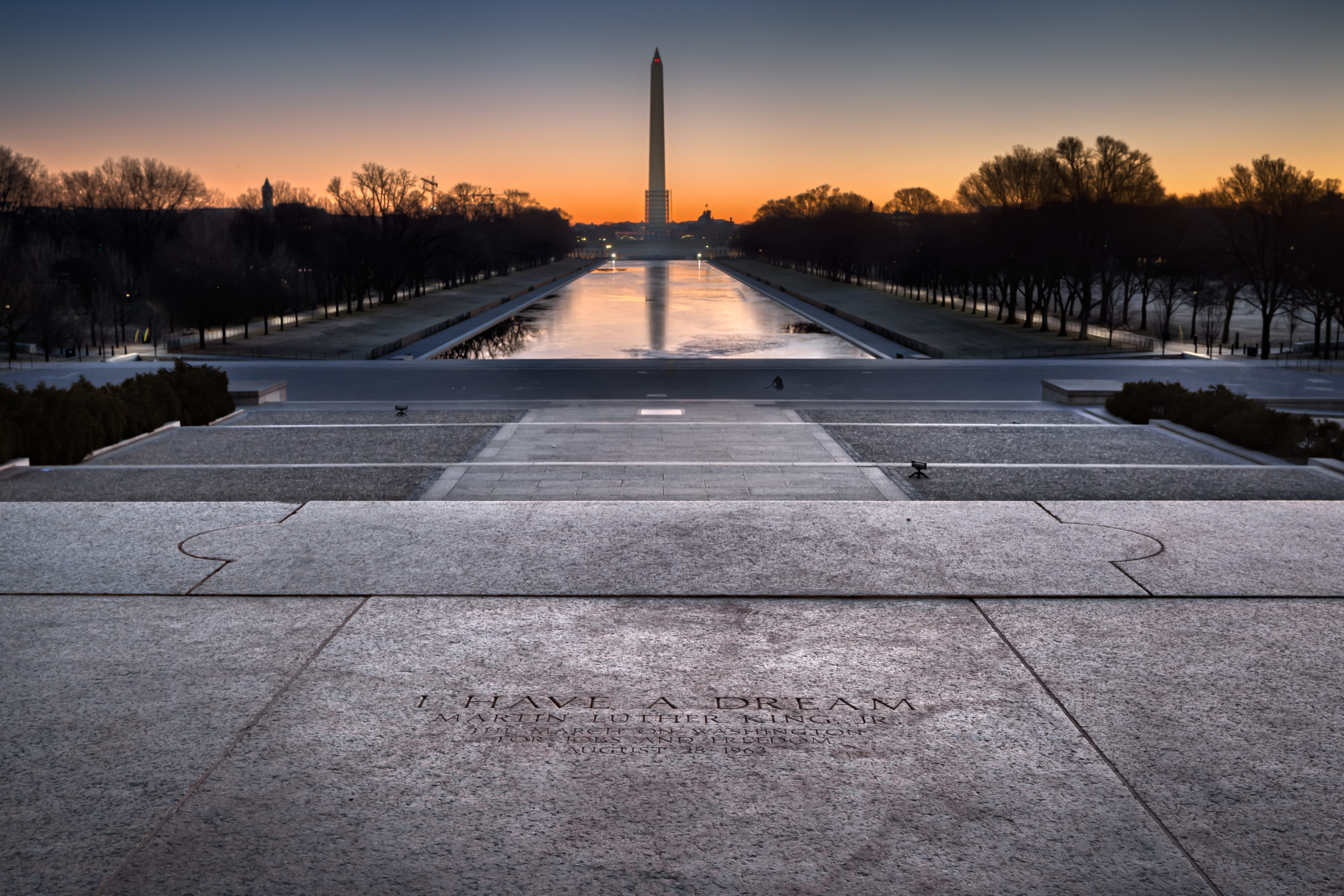 "I have a dream" engraving overlooking Washington Monument from perspective of Lincoln memorial