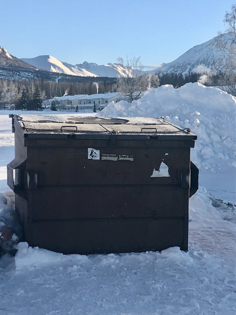 dumpster outside community center