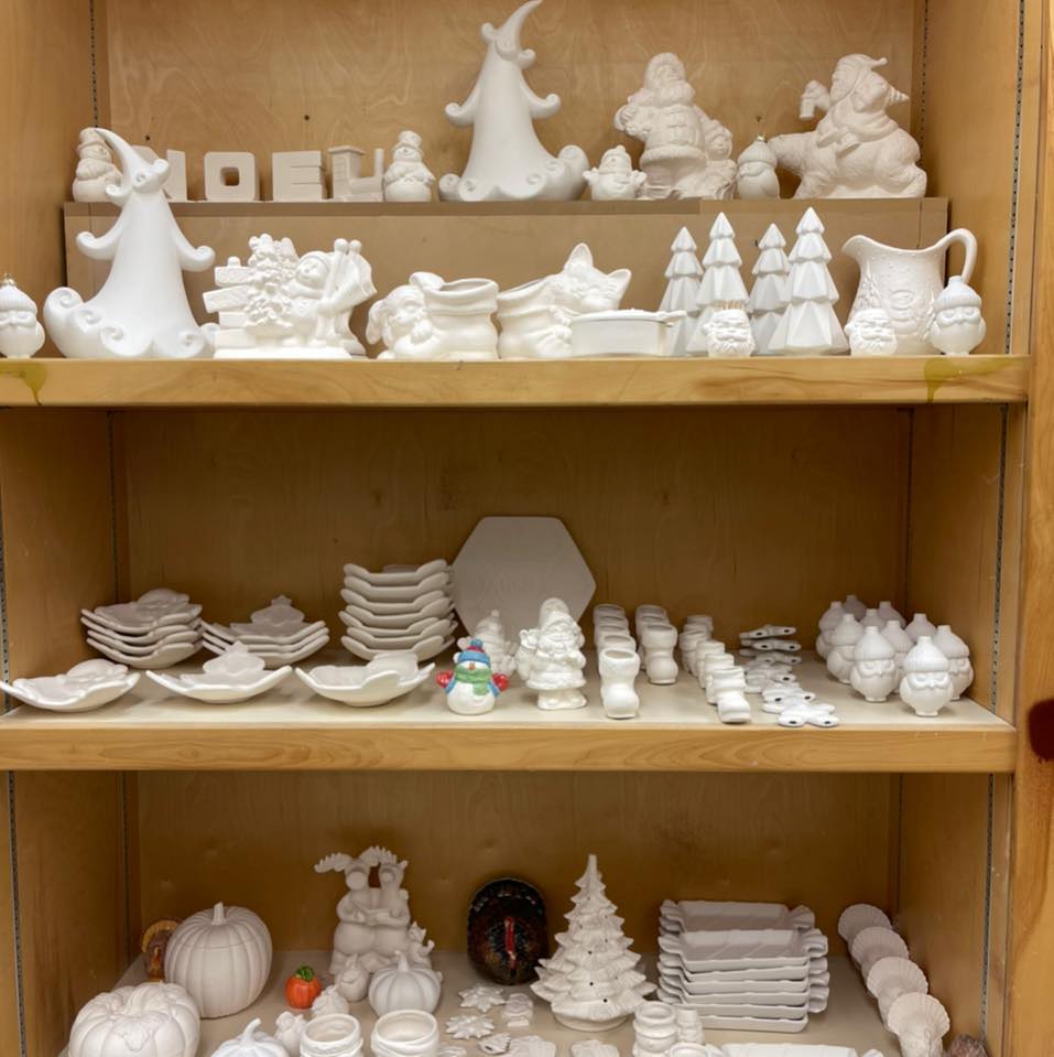 ceramic objects on shelf, not yet painted