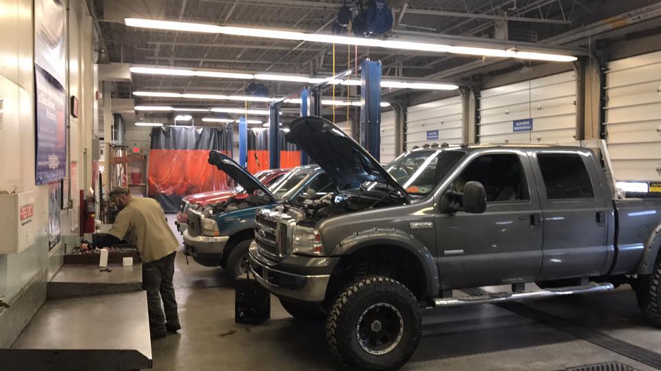 car being repaired in autoshop