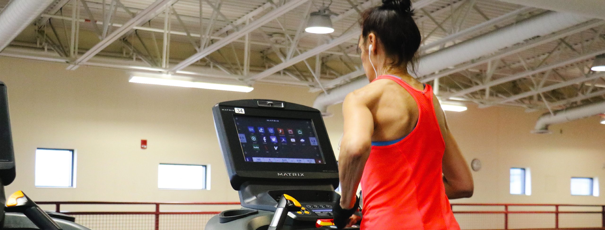 woman working out on treadmill